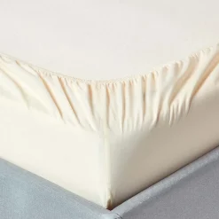 Drap-housse uni 90 x 190 cm 100 % coton égyptien 200 fils coloris crème ->Homescapes Hot