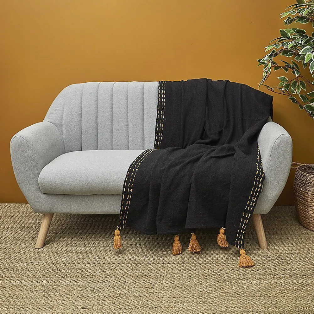Jeté de canapé surpiqué pompons noir 130x150 cm>The Home Deco Factory Hot