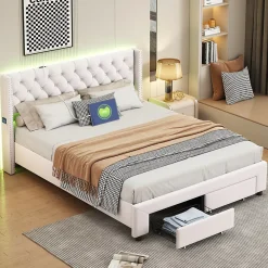 ProximaX Lit coffre 140x190 cm en velours beige, tête de lit cloutée, 2 tiroirs, ports USB, poches latérales, bande LED amovible* Lit Coffre