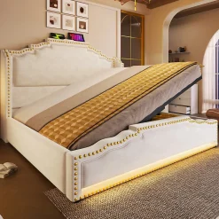 Lit 140x200 cm avec rangement hydraulique, éclairage LED multicolore et tête de lit tapissée en velours beige><noscript><img width=