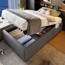 Lit 90x200 cm avec rangement hydraulique, tête de lit étagère en lin gris et ports USB-C, design contemporain><noscript><img width=