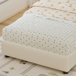 Lit 90x200 cm avec tête en forme de biscuit beige, cadre PU et métal, dossier rembourré et bords mousse><noscript><img width=