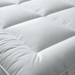Surmatelas 90x190 cm avec rembourrage en ouate de 1000 g/m²><noscript><img width=